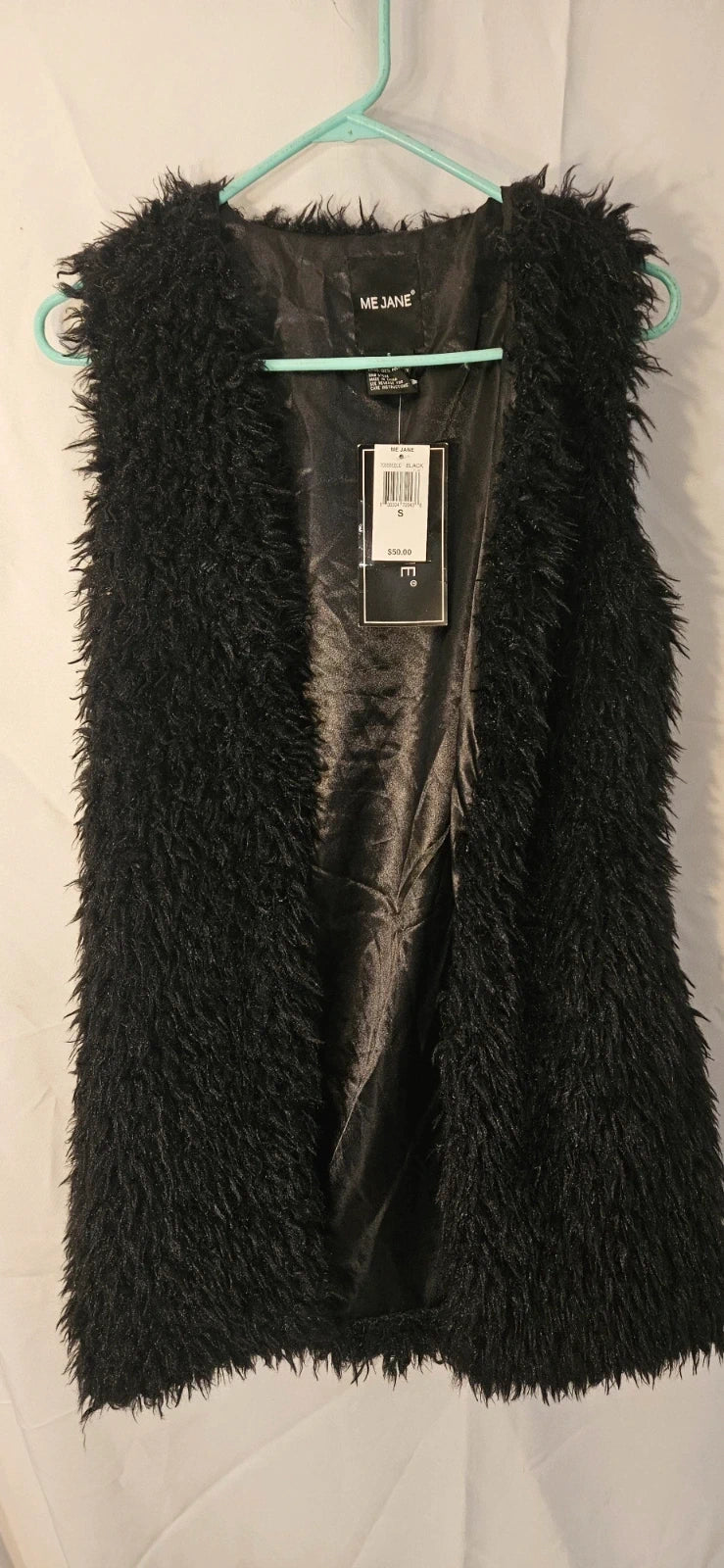 Women's Black fuzzy vest item 3600